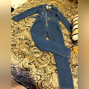 Fashion Nova Jump Suit. NWT, never worn. Very stretchy fabric.  Fits like 8/10